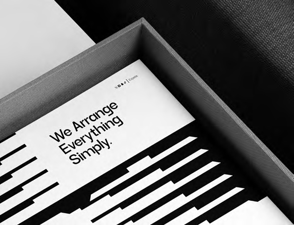 Experia print piece reading We Arrange Everything Simply
